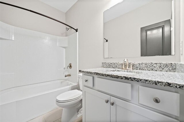 full bathroom with shower / bathtub combination, vanity, toilet, and tile patterned flooring