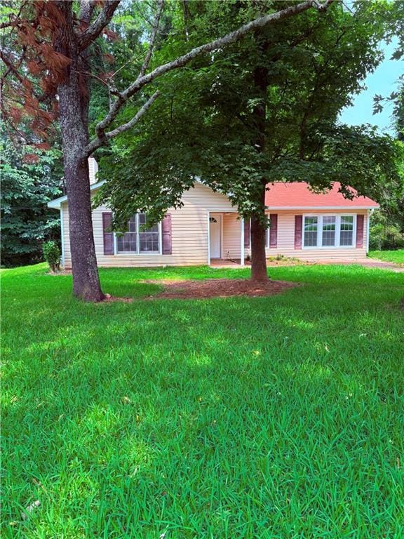 6103 Chaseland Dr, Rex, GA 30273 - view of front facade featuring a front lawn