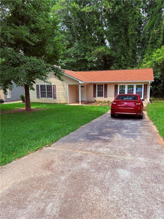 6103 Chaseland Dr, Rex, GA 30273 - ranch-style home featuring a front yard and driveway
