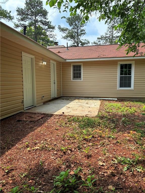 6103 Chaseland Dr, Rex, GA 30273 - rear view of property with a patio area
