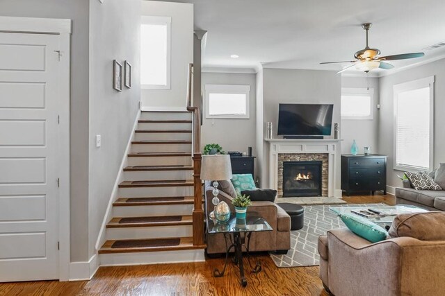 1976 Boyd Trace Ln NW, Atlanta, GA 30318 - living room featuring baseboards, stairway, wood finished floors, ceiling fan, and plenty of natural light