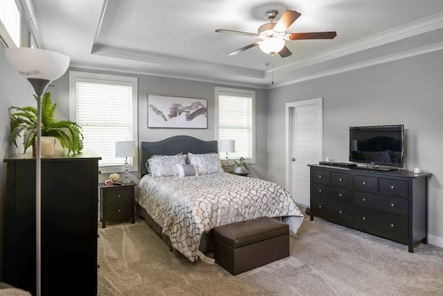 1976 Boyd Trace Ln NW, Atlanta, GA 30318 - bedroom featuring a tray ceiling, light carpet, multiple windows, ornamental molding, and ceiling fan