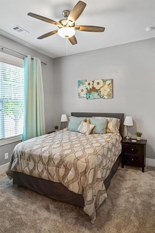 1976 Boyd Trace Ln NW, Atlanta, GA 30318 - carpeted bedroom with baseboards and ceiling fan
