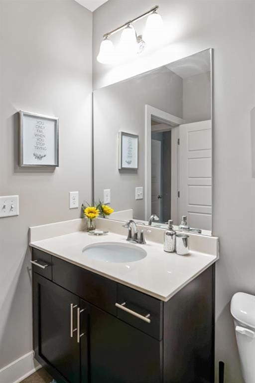 1976 Boyd Trace Ln NW, Atlanta, GA 30318 - bathroom featuring vanity and toilet