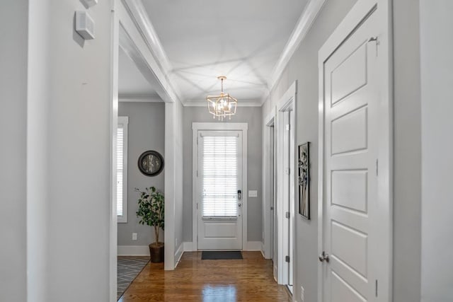 1976 Boyd Trace Ln NW, Atlanta, GA 30318 - entrance foyer with a chandelier, wood finished floors, crown molding, and baseboards