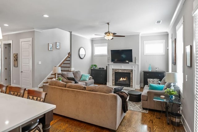 1976 Boyd Trace Ln NW, Atlanta, GA 30318 - living room with ornamental molding, a ceiling fan, dark wood-style flooring, stairs, and a fireplace
