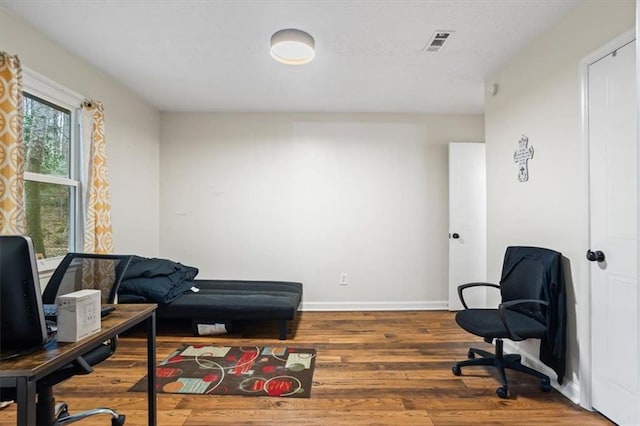 living area featuring hardwood / wood-style floors