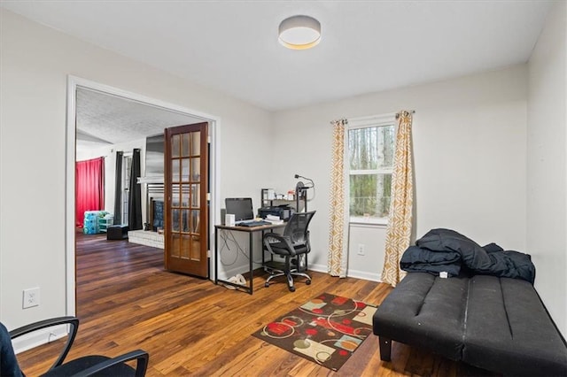 home office featuring dark hardwood / wood-style floors