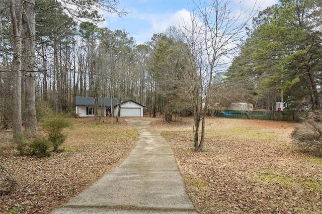 view of yard featuring a garage