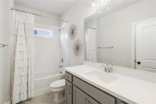 full bathroom featuring shower / bath combo, vanity, and toilet