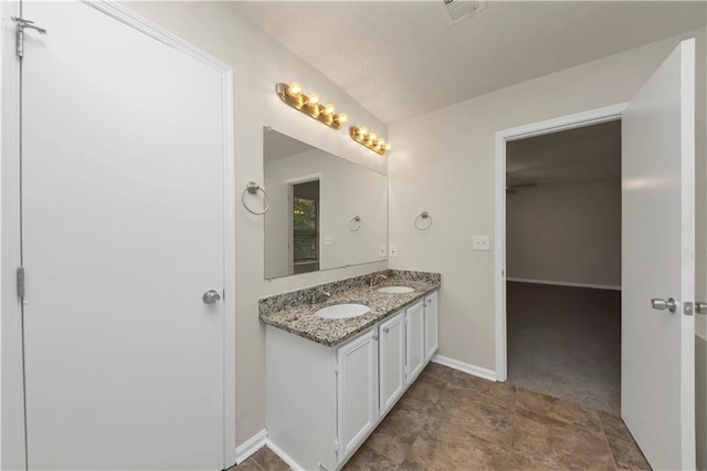 bathroom featuring vanity