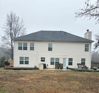 215 Bradley St, Covington, GA 30016 - back of house with a patio area and a lawn