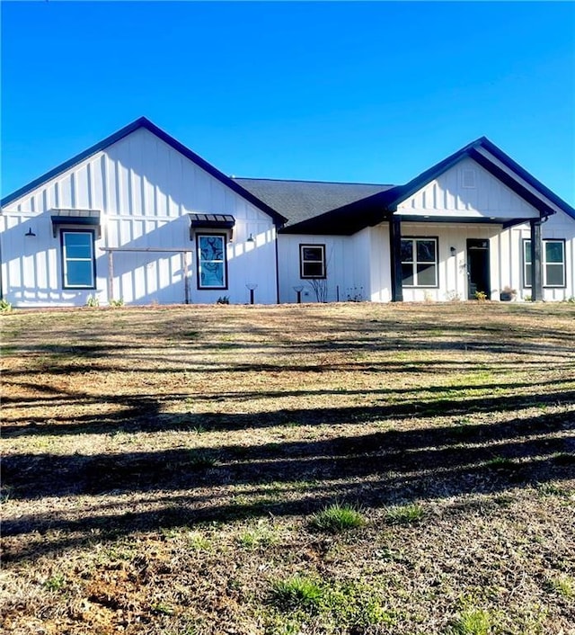 modern farmhouse style home featuring board and batten siding