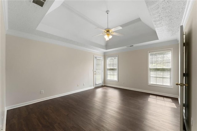 16 Kentucky Walk NE, Cartersville, GA 30121 - empty room featuring a raised ceiling, ceiling fan, dark wood finished floors, baseboards, and ornamental molding
