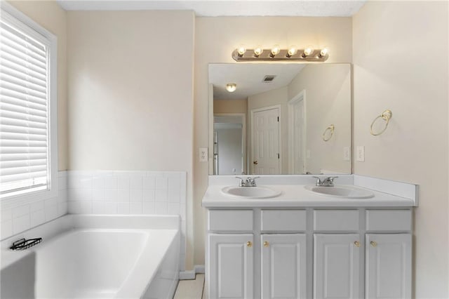 16 Kentucky Walk NE, Cartersville, GA 30121 - full bath with double vanity and a garden tub