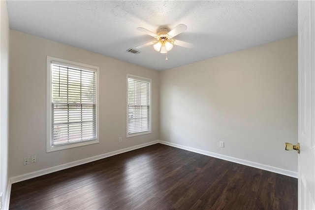 16 Kentucky Walk NE, Cartersville, GA 30121 - unfurnished room featuring dark wood-type flooring, a ceiling fan, baseboards, and a textured ceiling