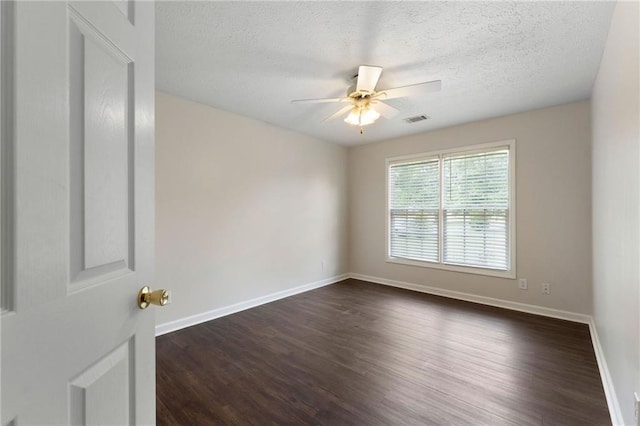 16 Kentucky Walk NE, Cartersville, GA 30121 - unfurnished room featuring ceiling fan, dark wood-style flooring, baseboards, and a textured ceiling