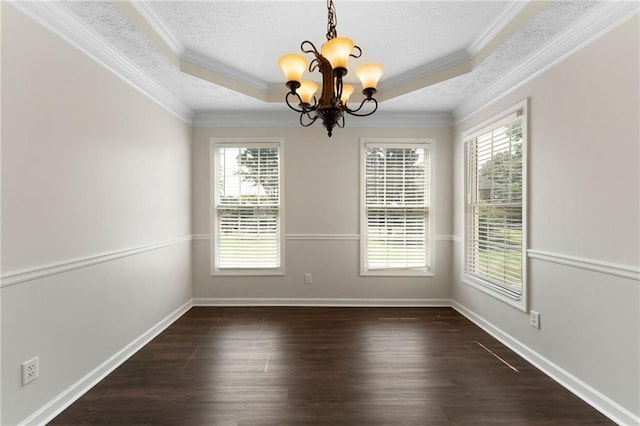 16 Kentucky Walk NE, Cartersville, GA 30121 - unfurnished room featuring a tray ceiling, a chandelier, healthy amount of natural light, ornamental molding, and dark wood-style floors