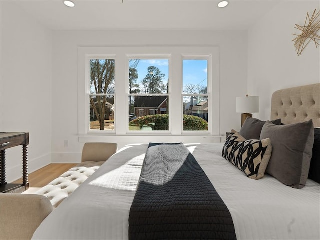 bedroom with light hardwood / wood-style floors