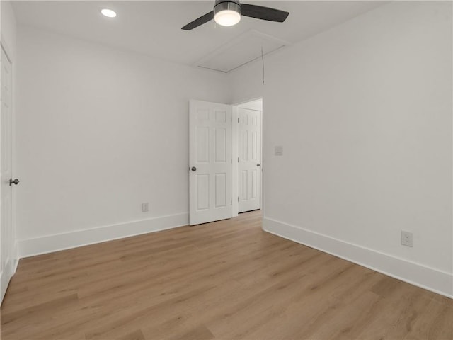 spare room featuring light hardwood / wood-style flooring