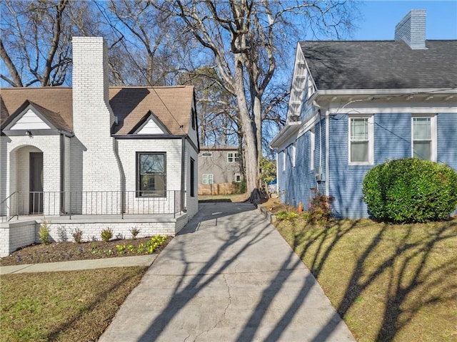 view of side of home featuring a yard