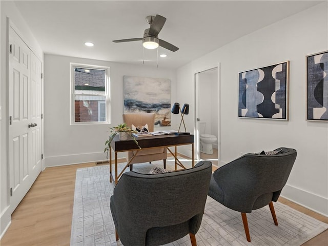 office area featuring ceiling fan and light hardwood / wood-style floors