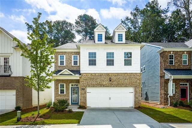 view of front of property with driveway, an attached garage, and brick siding