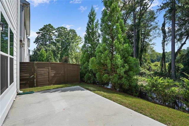 view of patio / terrace featuring fence