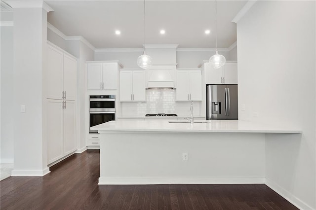 kitchen with white cabinetry, stainless steel appliances, a sink, and light countertops