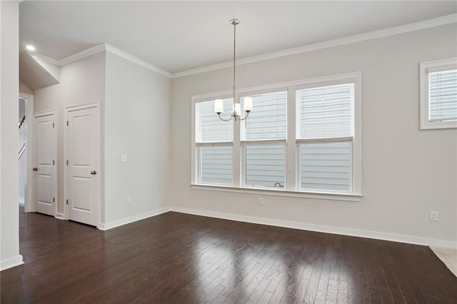 unfurnished dining area with crown molding, dark wood-type flooring, a chandelier, and baseboards