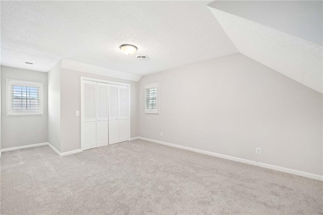 2279 Jerusalem Church Rd, Jasper, GA 30143 - unfurnished bedroom with carpet, a textured ceiling, and multiple windows