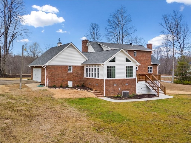 2279 Jerusalem Church Rd, Jasper, GA 30143 - back of house with central AC unit, a garage, and a lawn