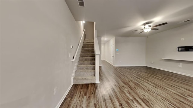 interior space featuring ceiling fan and hardwood / wood-style floors