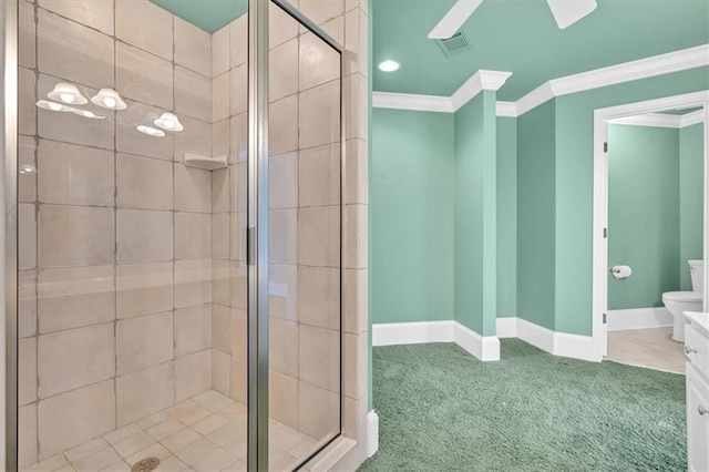 full bath with visible vents, a stall shower, crown molding, and baseboards