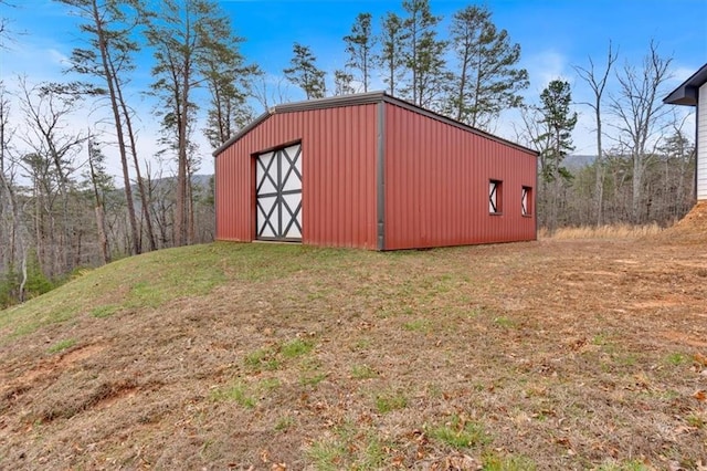 view of outbuilding with an outdoor structure