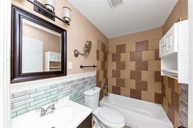 2702 Rollingwood Ln SE, Atlanta, GA 30316 - bathroom with vanity, shower / tub combination, and tile walls