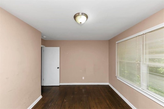 2702 Rollingwood Ln SE, Atlanta, GA 30316 - unfurnished room with wood finished floors and baseboards