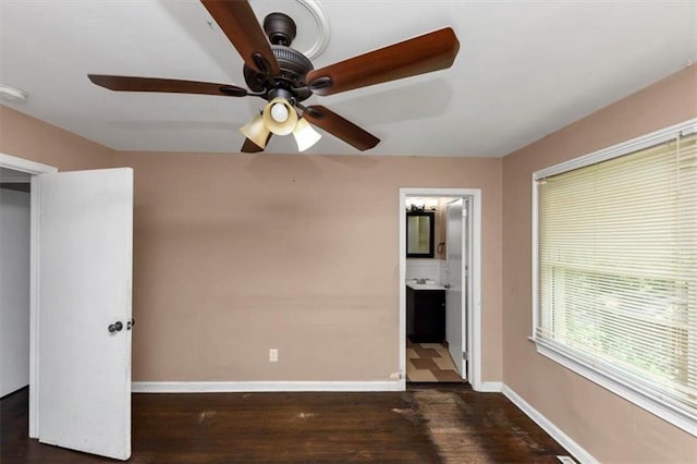 2702 Rollingwood Ln SE, Atlanta, GA 30316 - spare room with dark wood-type flooring and a ceiling fan