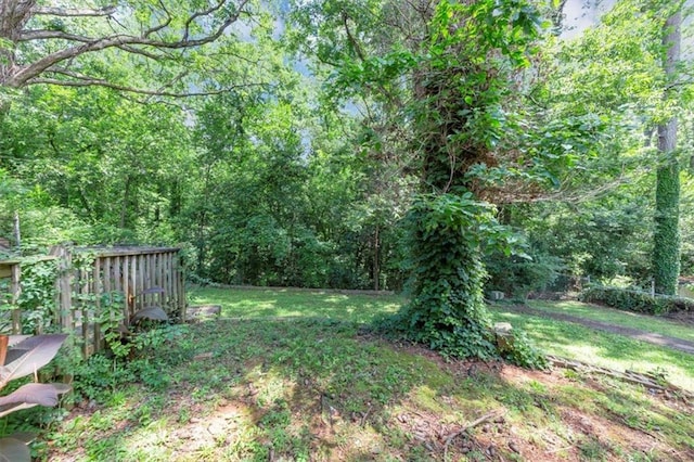 2702 Rollingwood Ln SE, Atlanta, GA 30316 - view of yard with a forest view