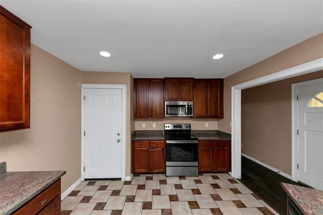2702 Rollingwood Ln SE, Atlanta, GA 30316 - kitchen featuring stainless steel appliances, recessed lighting, and dark countertops