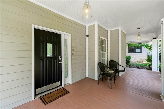 entrance to property with a porch