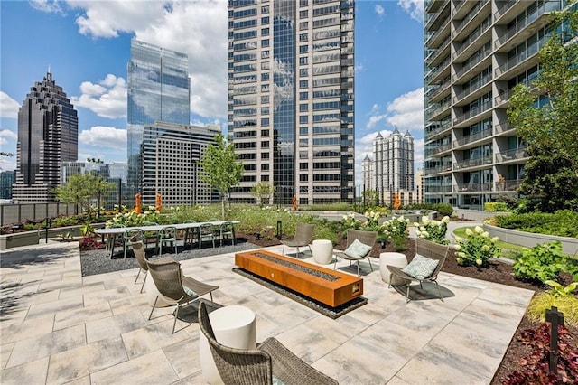 view of patio / terrace featuring a city view