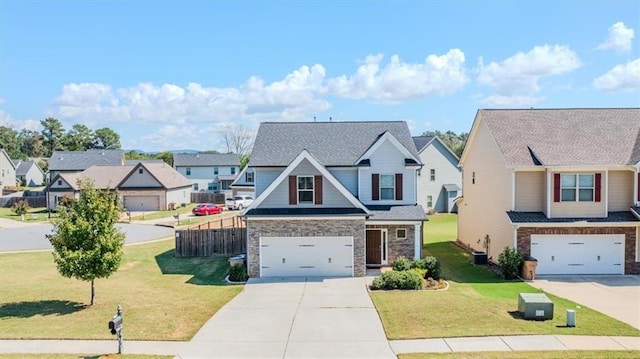 view of front facade featuring a front yard and a garage