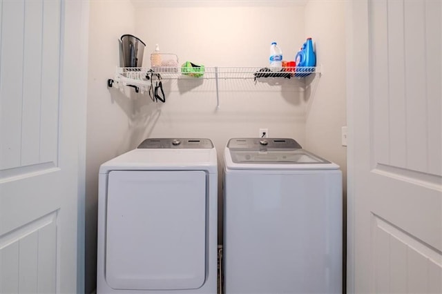 laundry room featuring washer and clothes dryer