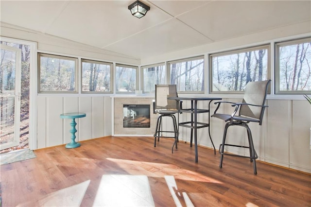 sunroom / solarium with lofted ceiling