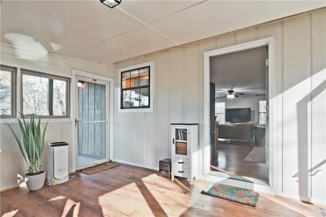 interior space featuring ceiling fan and wood-type flooring