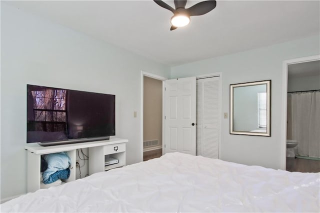 bedroom with ceiling fan, a closet, and connected bathroom