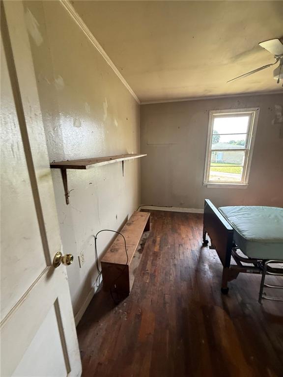 1561 Demorest Mount Airy Hwy, Mount Airy, GA 30563 - unfurnished room with hardwood / wood-style floors, ceiling fan, and ornamental molding