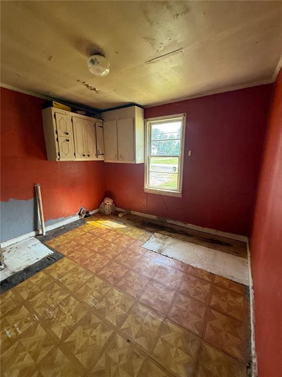 1561 Demorest Mount Airy Hwy, Mount Airy, GA 30563 - laundry area with light floors and ornamental molding