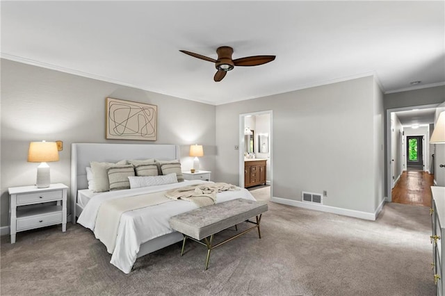 1075 Winding Branch Ln, Atlanta, GA 30338 - bedroom with crown molding, baseboards, carpet flooring, a ceiling fan, and ensuite bath